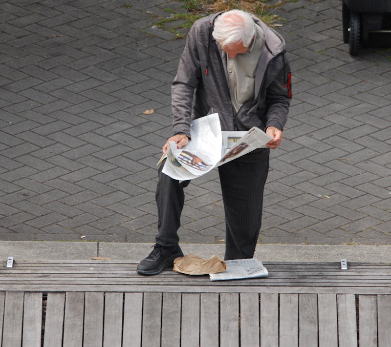 Some still reads a Paper photo by Robert A Bell
