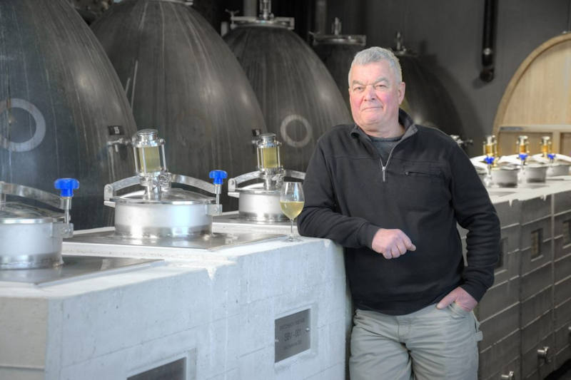 Steve Lornie, co-owner of Okanagan Crush Pad Winery (OCP), with tanks he made from sand and gravel taken from OCP's three organic vineyards.